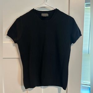 100% cashmere sweater. Women’s small, black. Excellent condition. Short sleeved.